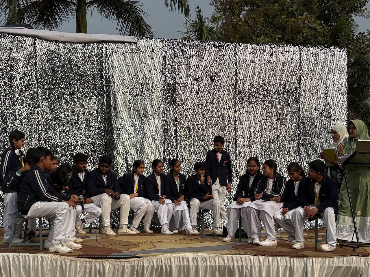 Students sitting together during annual function